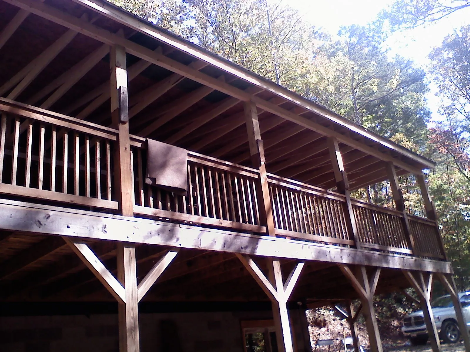 Timber framing under a new elevated porch and deck — Roof Leak Repair in Castella by Roofing Brothers